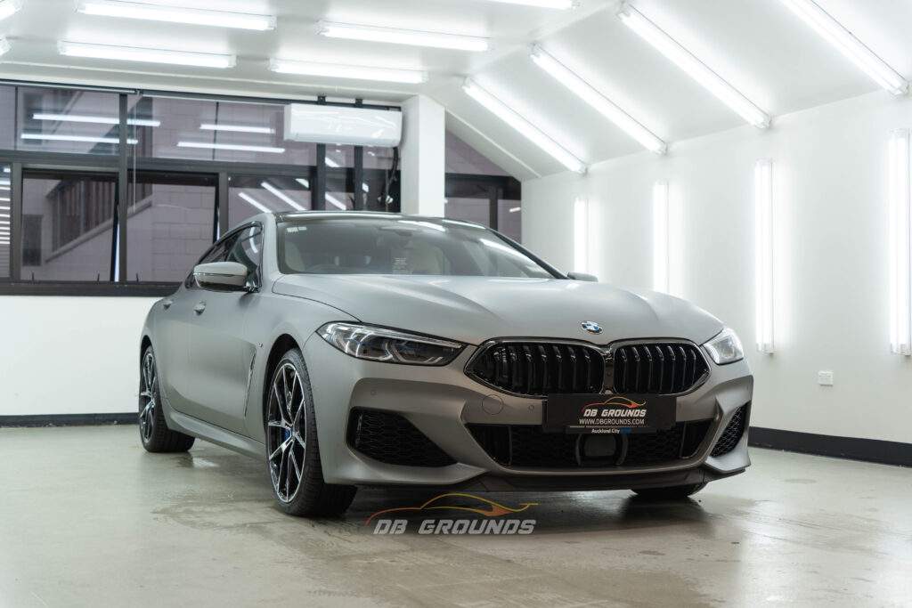 BMW with gray colour wrapping by DB grounds